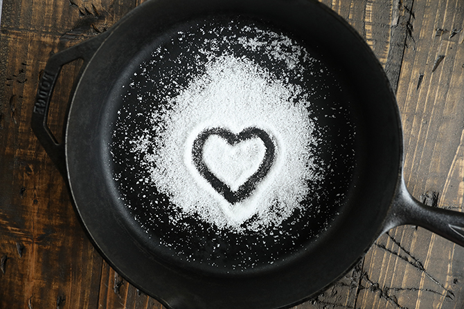heart drawn in salt in a cast iron skillet