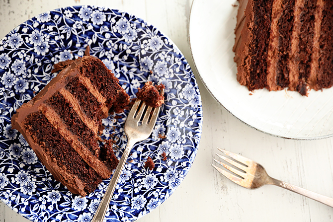 Slices of Triple Chocolate Mousse Cake on plates