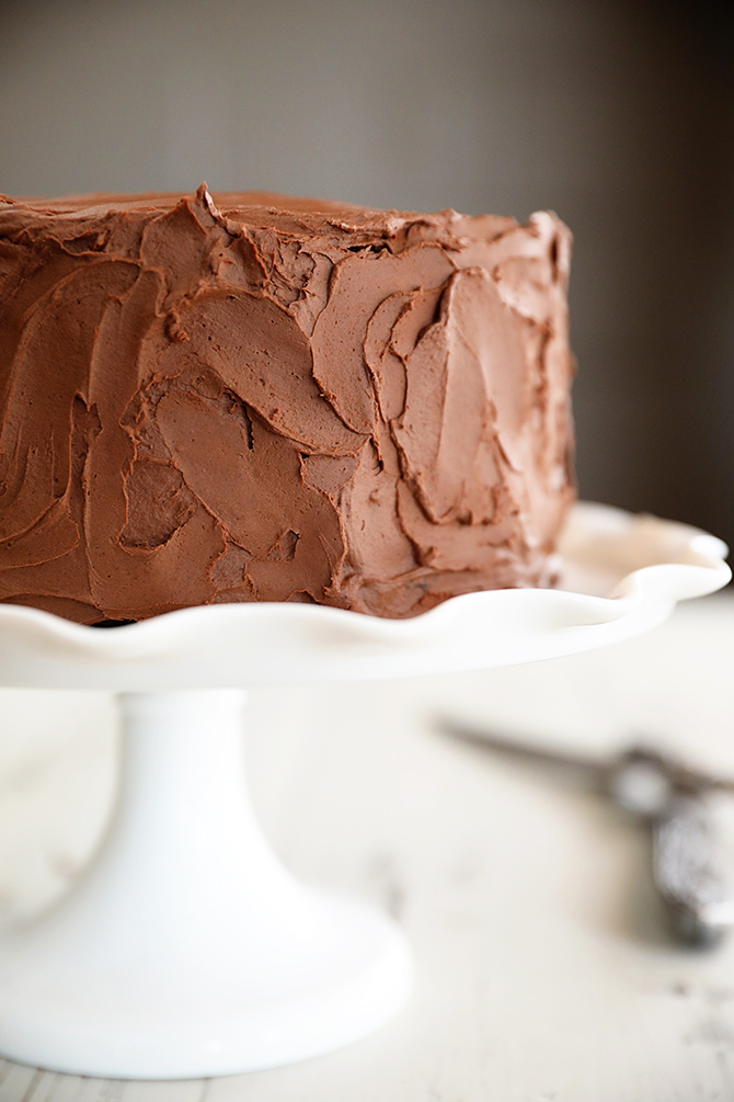 Triple Chocolate Mousse Cake on cake stand