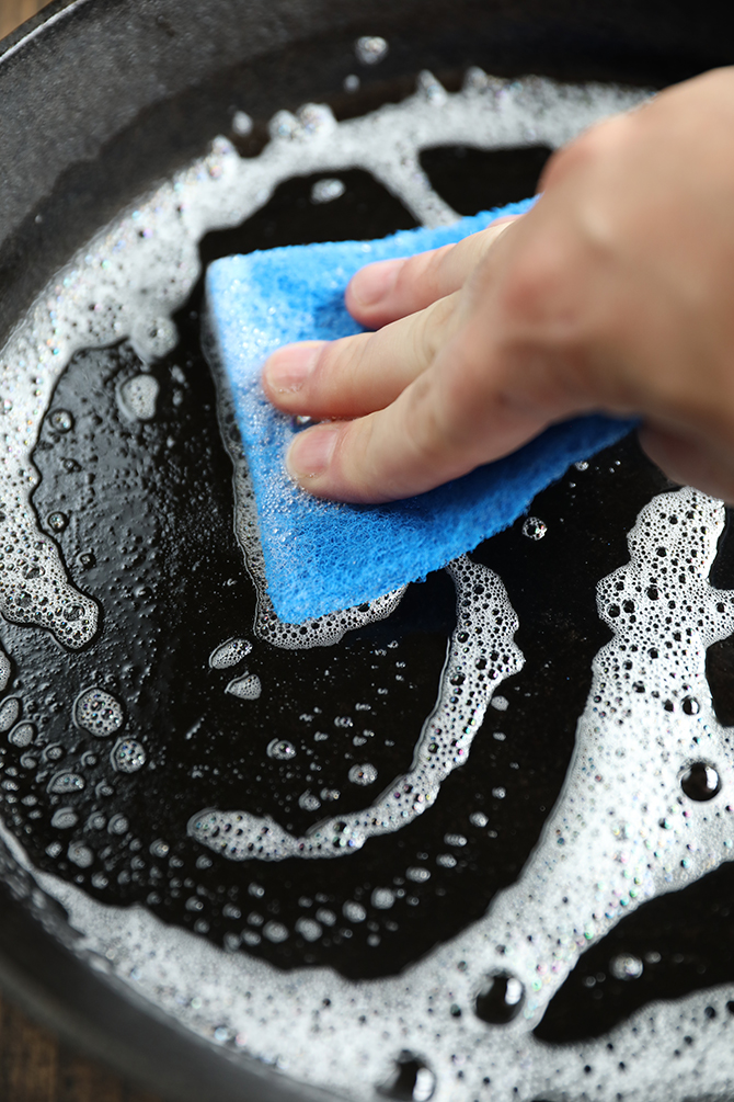 Washing a cast iron pan with soap