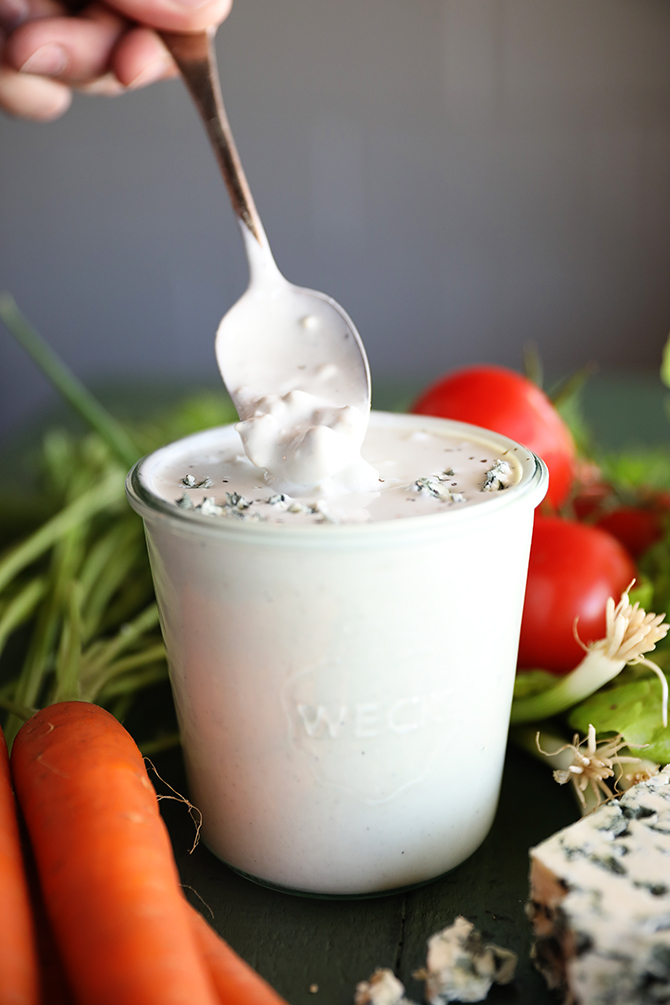 Spoon in jar of Chunky Buttermilk Blue Cheese Dressing