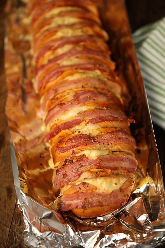Cheesy Swiss Bacon Ranch Bread on aluminum foil