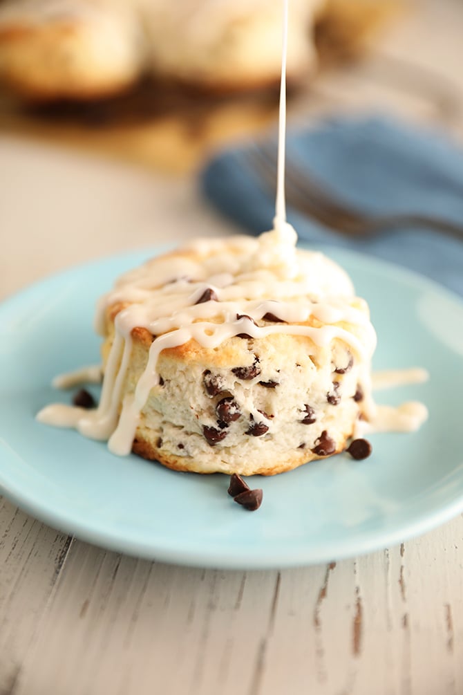 Chocolate Chip Biscuit being drizzled with glaze