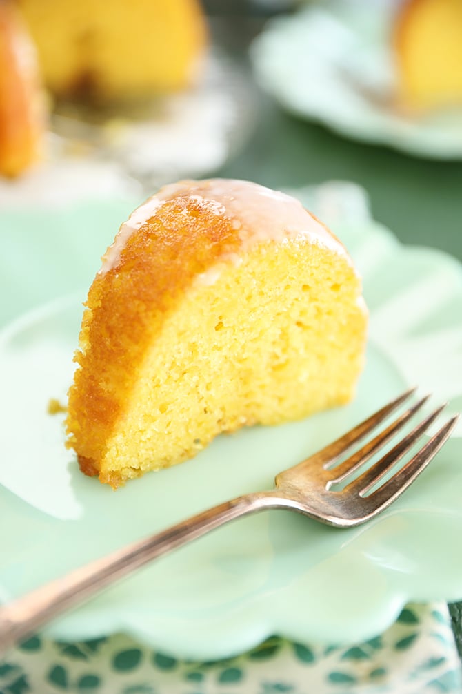 Slice of Vintage Lemon Apricot Nectar Cake on a green plate