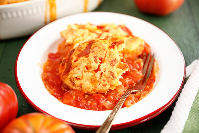 Plate of Tomato Cobbler with Pimento Cheese Biscuits