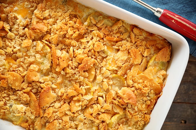 Baking dish filled with Ultimate Cheesy Squash Casserole