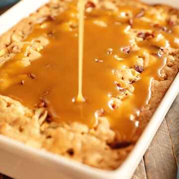 Caramel Sauce being drizzled over Apple Dapple Cake