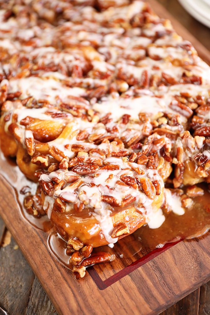 Shortcut Caramel Pecan Cinnamon Rolls on a board