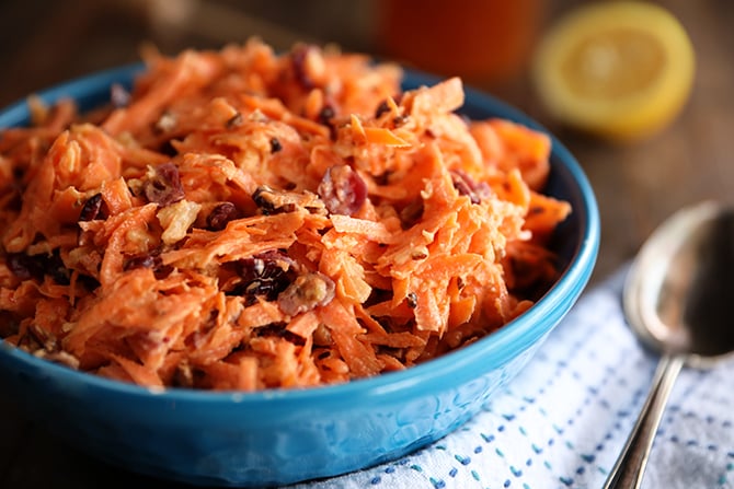 Carrot Cranberry Salad in a blue bowl