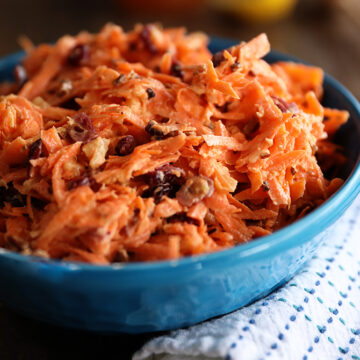 Carrot Cranberry Salad in a blue bowl