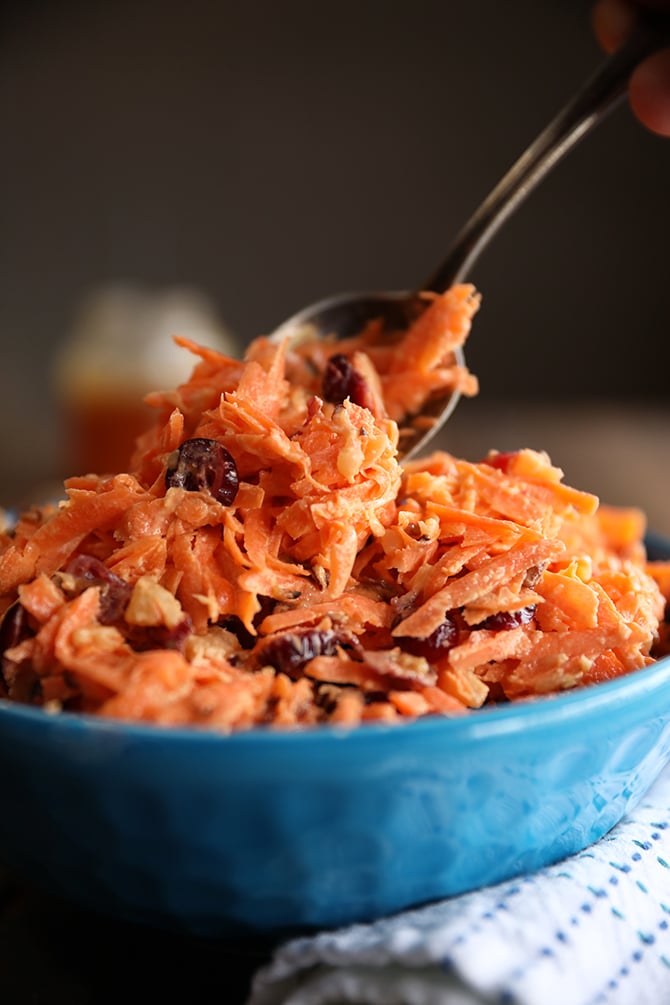 Carrot Cranberry Salad in a blue bowl