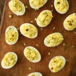 Dill Pickle Deviled Eggs on cutting board