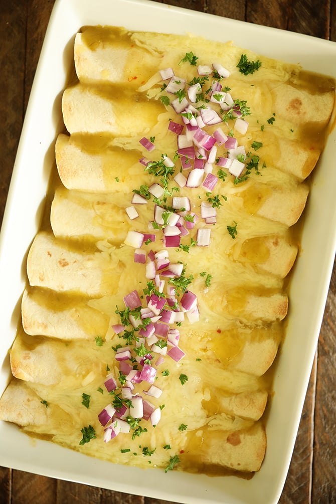 Overhead view of Creamy Chicken Enchiladas in a dish