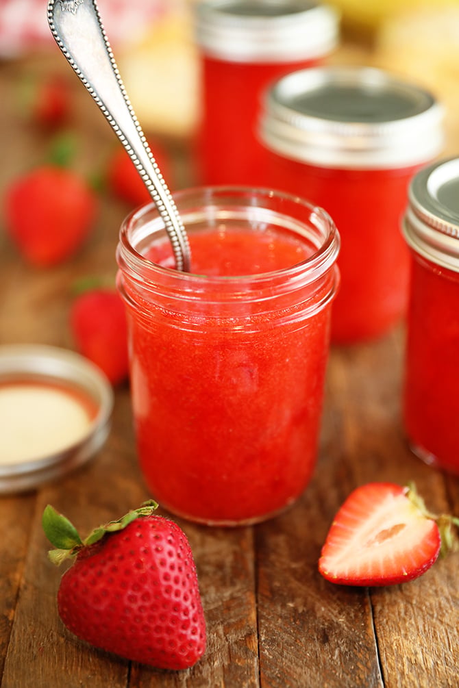 Jar of Easy Strawberry Freezer Jam with spoon