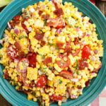 Sweet Corn Salad with Bacon in a Teal Bowl.