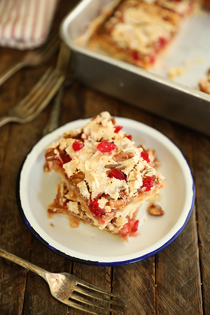 Cherry Coconut Pecan Bars stacked on a plate
