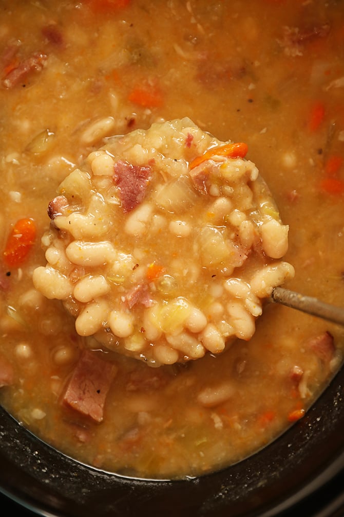 scoop of Slow Cooker Ham and Beans