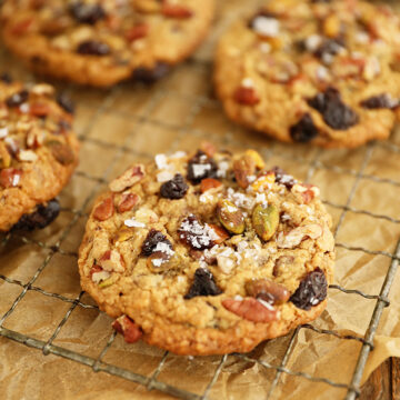 Chocolate, Cherry, Pistachio, Pecan Cookies on wire rack