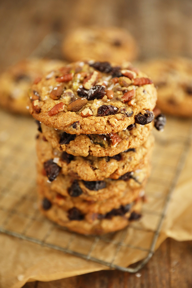 Stack of Chocolate, Cherry, Pistachio, Pecan Cookies on wire rack