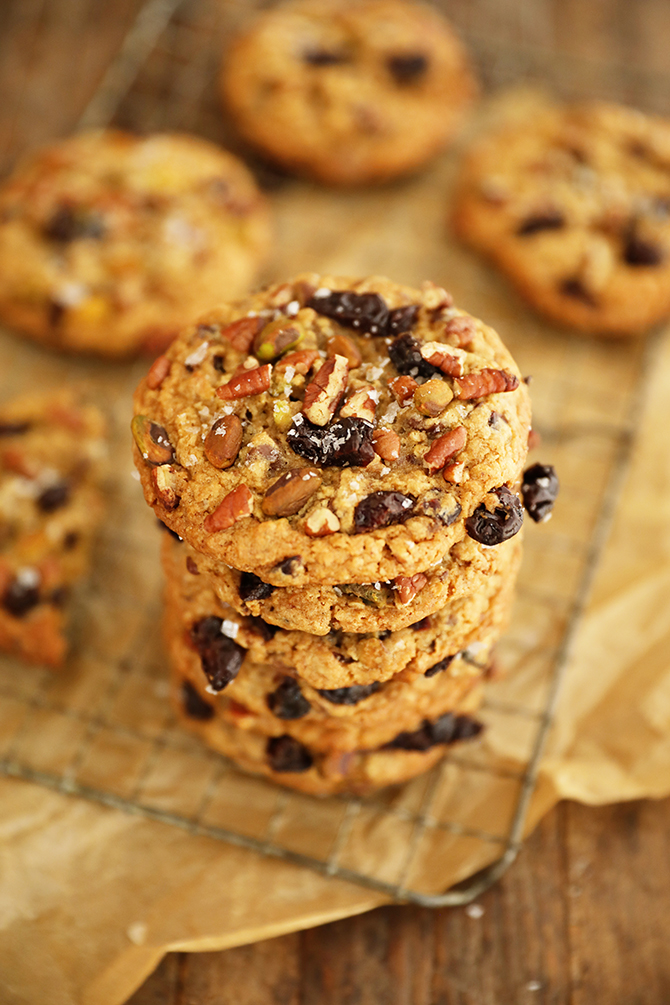 Stack of Chocolate, Cherry, Pistachio, Pecan Cookies on wire rack