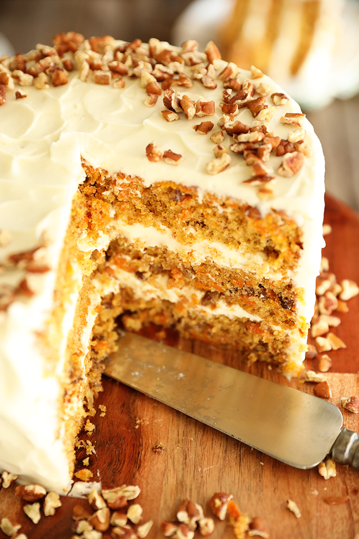 carrot cake with slices missing.