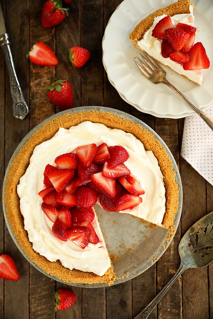 Overhead view of Strawberry Cream Cheese Pie with one piece missing.