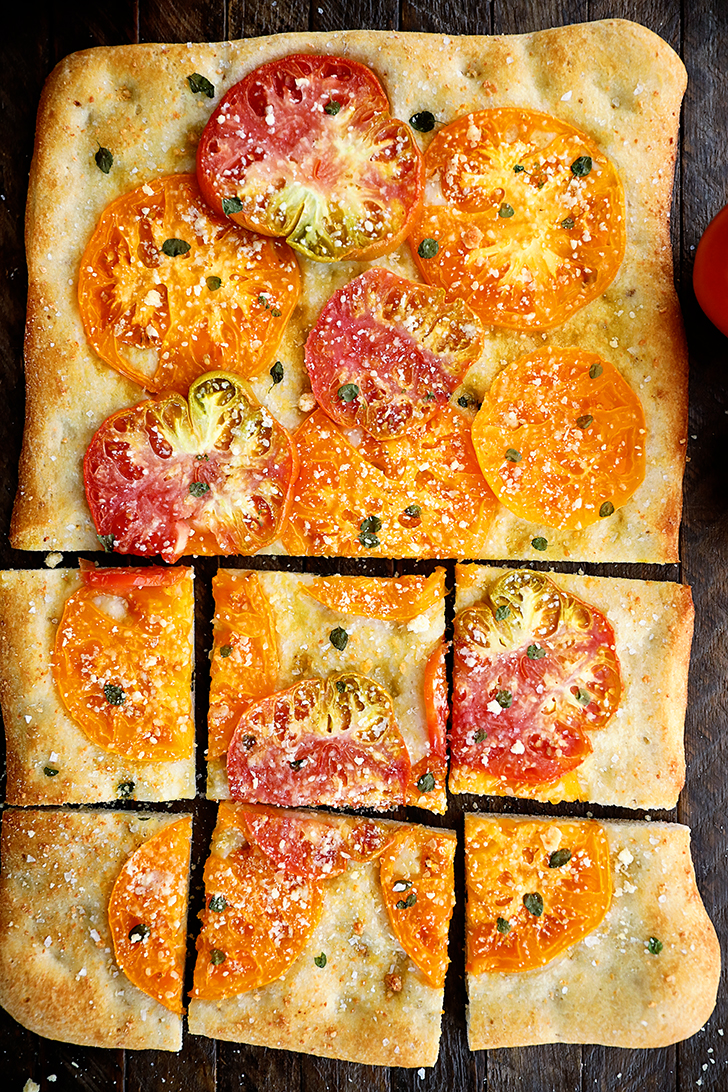 Shortcut Tomato Focaccia on a cutting board.