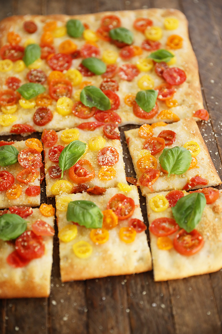Shortcut Tomato Focaccia on a cutting board.