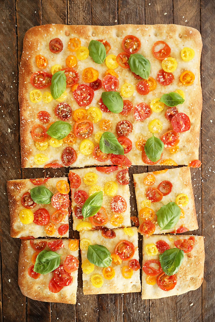 Shortcut Tomato Focaccia on a cutting board.