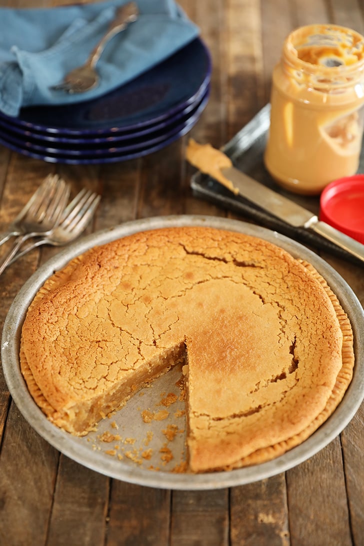 whole Peanut Butter Chess Pie with slice missing.