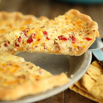 Sideview of slice of Bacon and Pimento Cheese Quiche