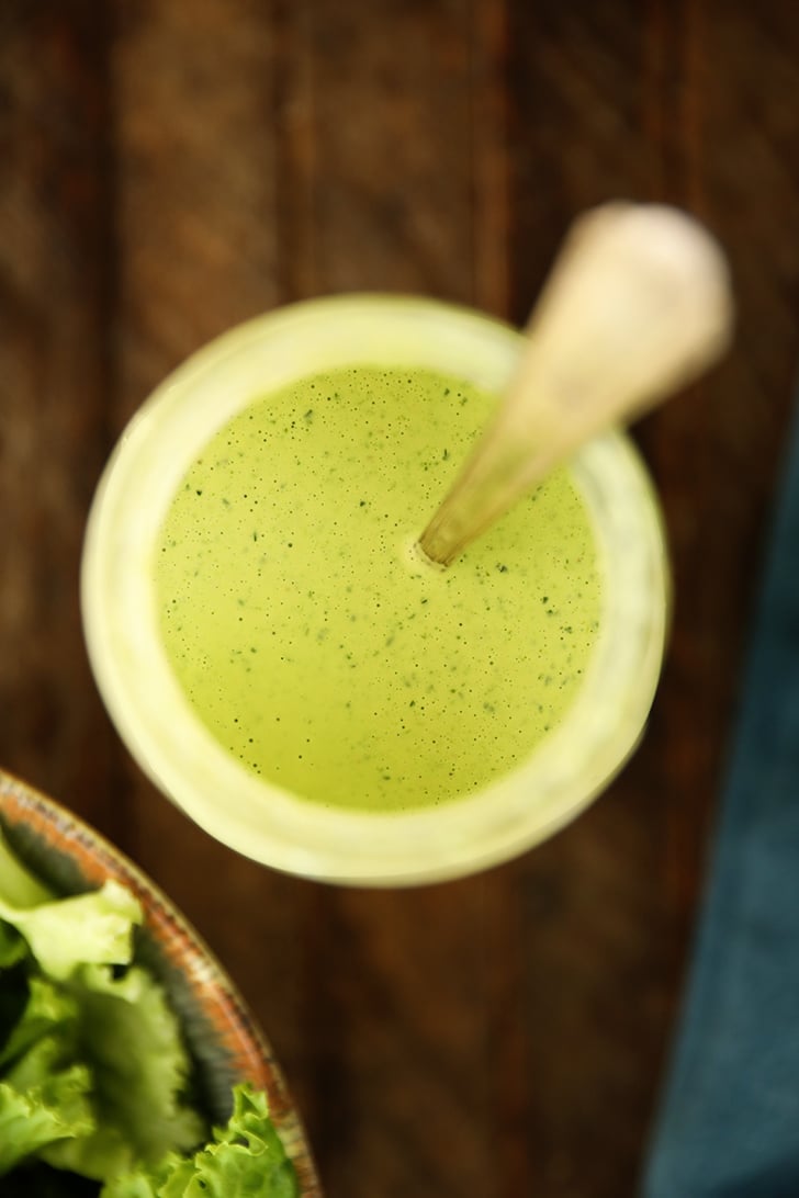 Overhead view of Green Goddess Salad Dressing in a jar.
