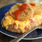 Open faced grilled pimento cheese with fried green tomatoes.
