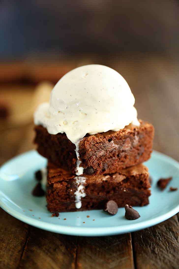 two brownies with ice cream on top.