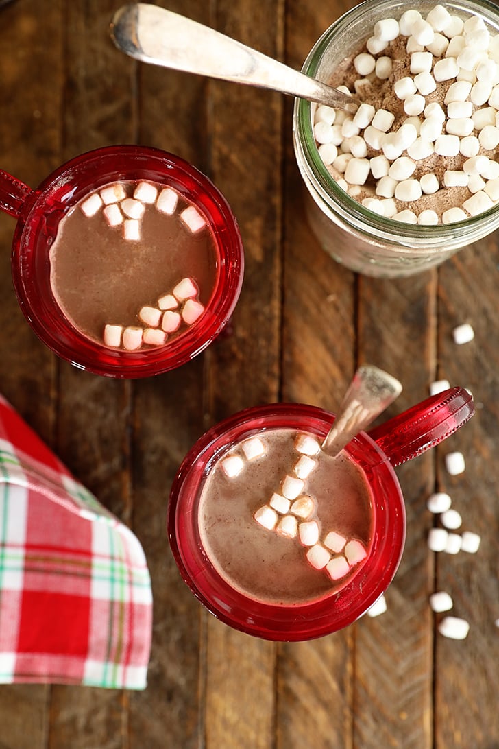 Overhead view of Homemade Hot Chocolate in red cups.