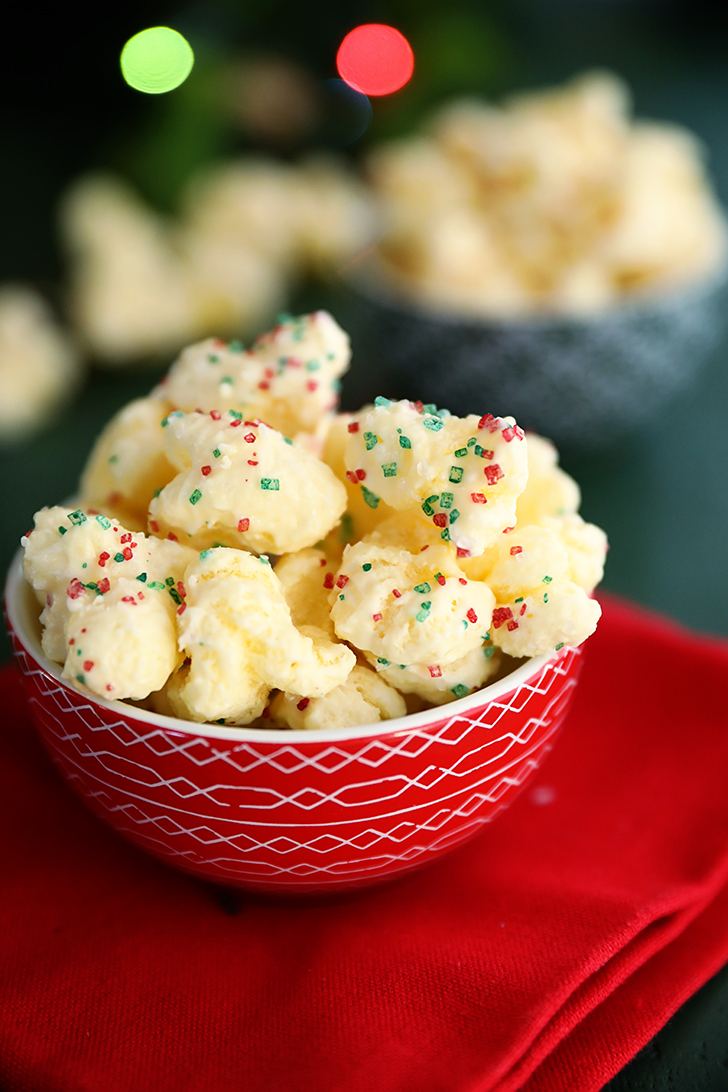 Candied Puff Corn in a small red bowl.