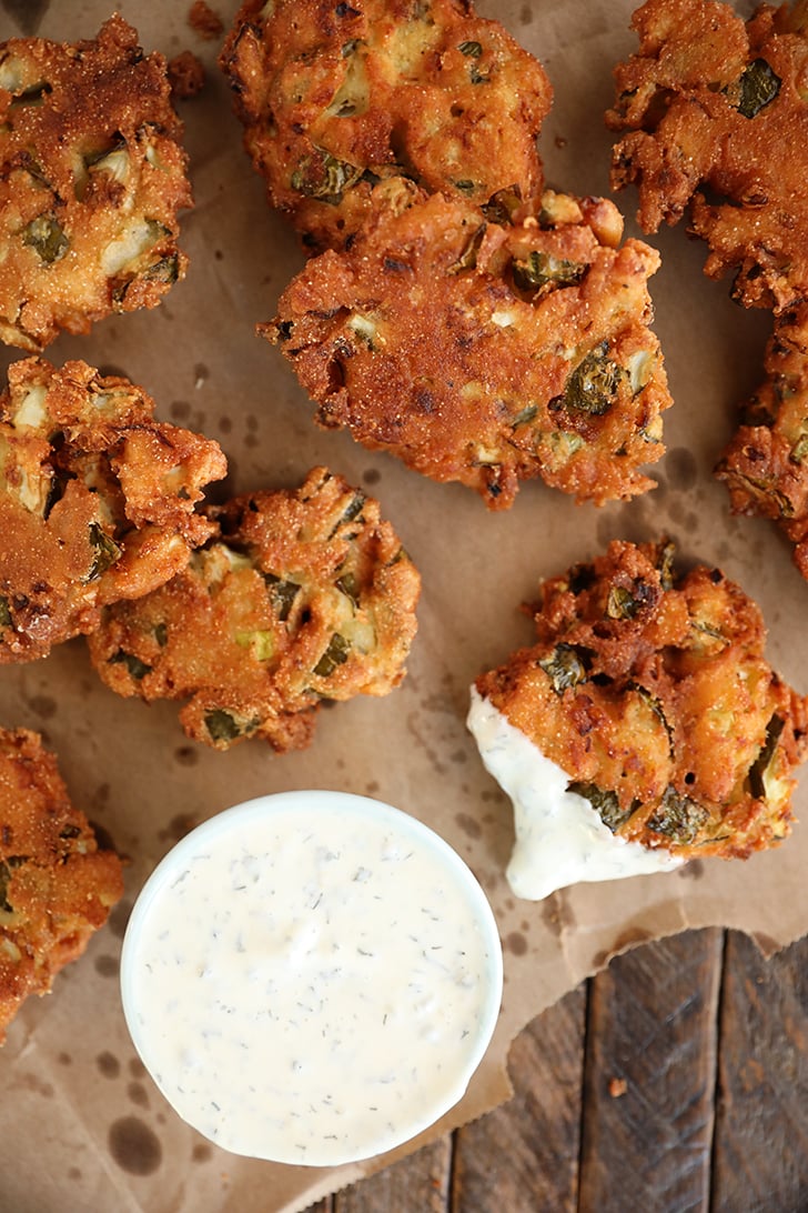 Overhead view of Fried Pickle Fritters with ranch.