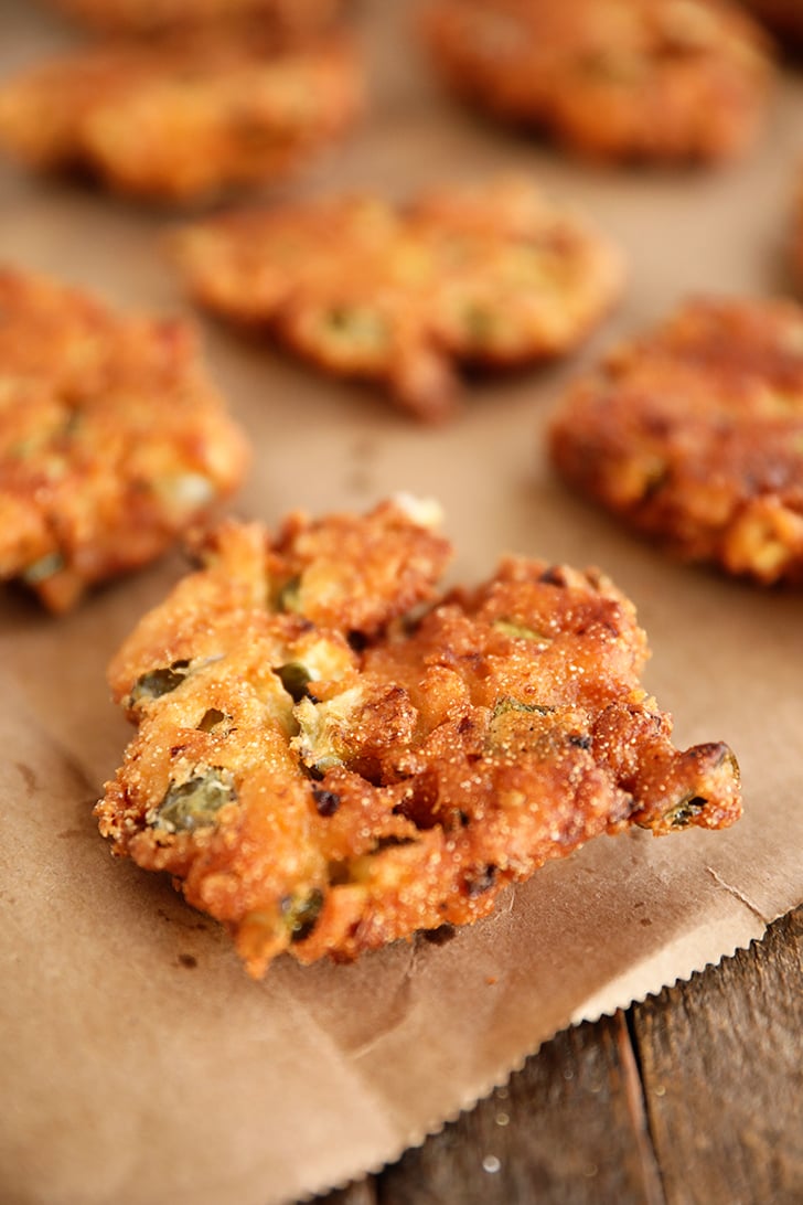 Closeup of Fried Pickle Fritter on brown paper.