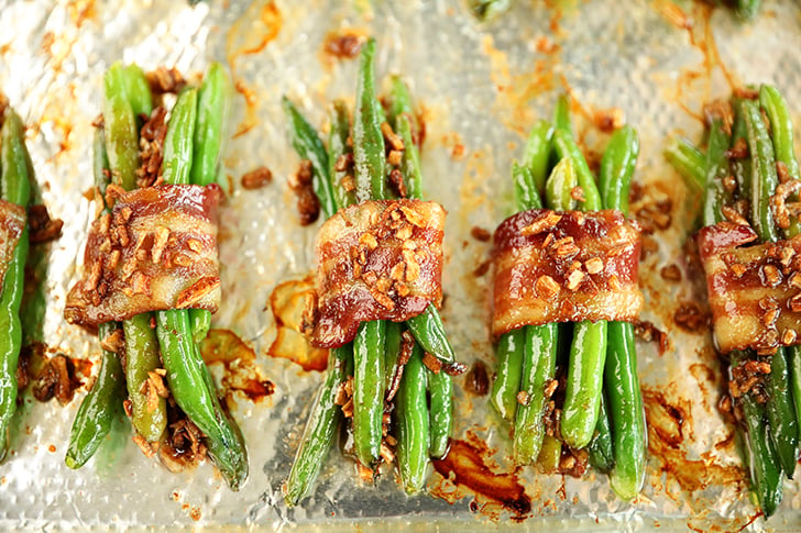 Green Bean Bundles on sheet pan.