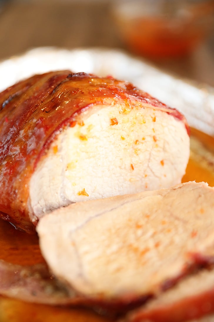 Sliced Bacon-Wrapped Pork Loin with Pepper Jelly Glaze.