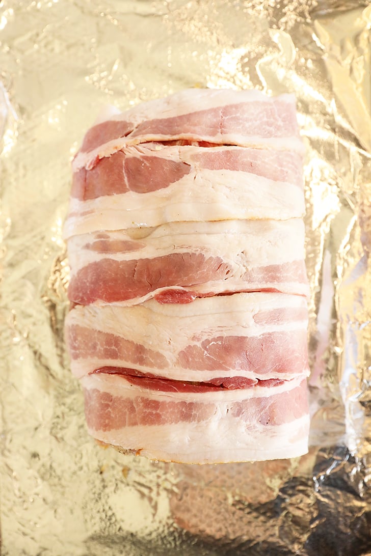 Pork loin roast wrapped in bacon.