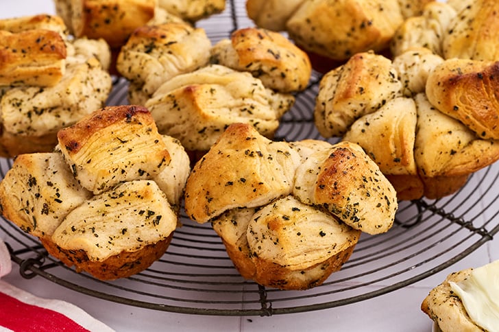Shortcut Garlic Herb Pull-Apart Rolls on a wire rack.