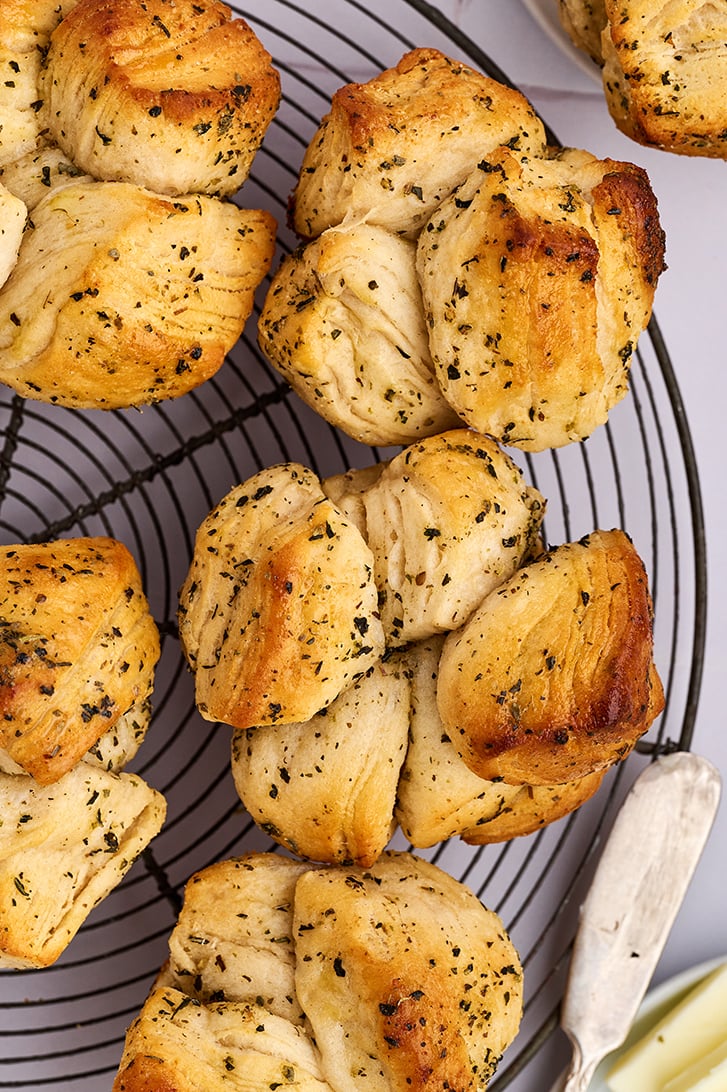 Shortcut Garlic Herb Pull-Apart Rolls on a wire rack.