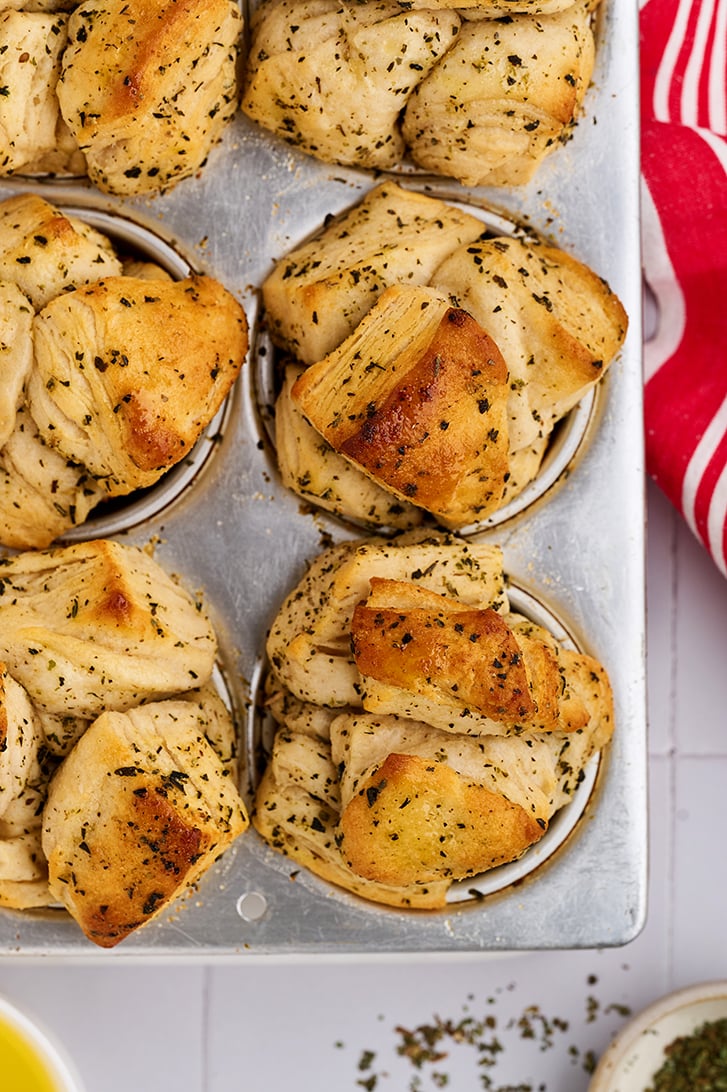 Shortcut Garlic Herb Pull-Apart Rolls in muffin pan.