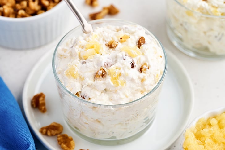 Pineapple Walnut Salad in a clear bowl.