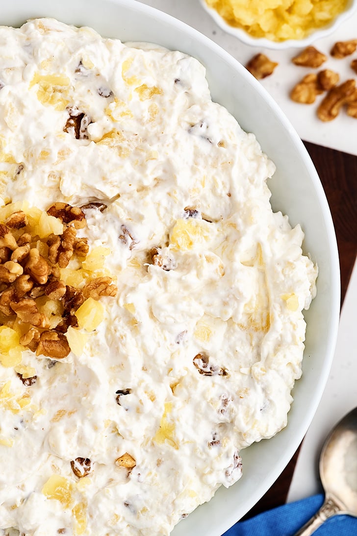 Overhead shot of Pineapple Walnut Salad in a white bowl.