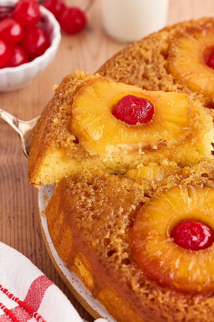 Serving a slice of Skillet Pineapple Upside-Down Cake.