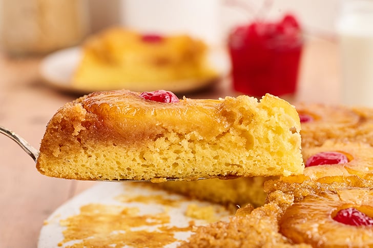Side view of slice of Skillet Pineapple Upside-Down Cake.