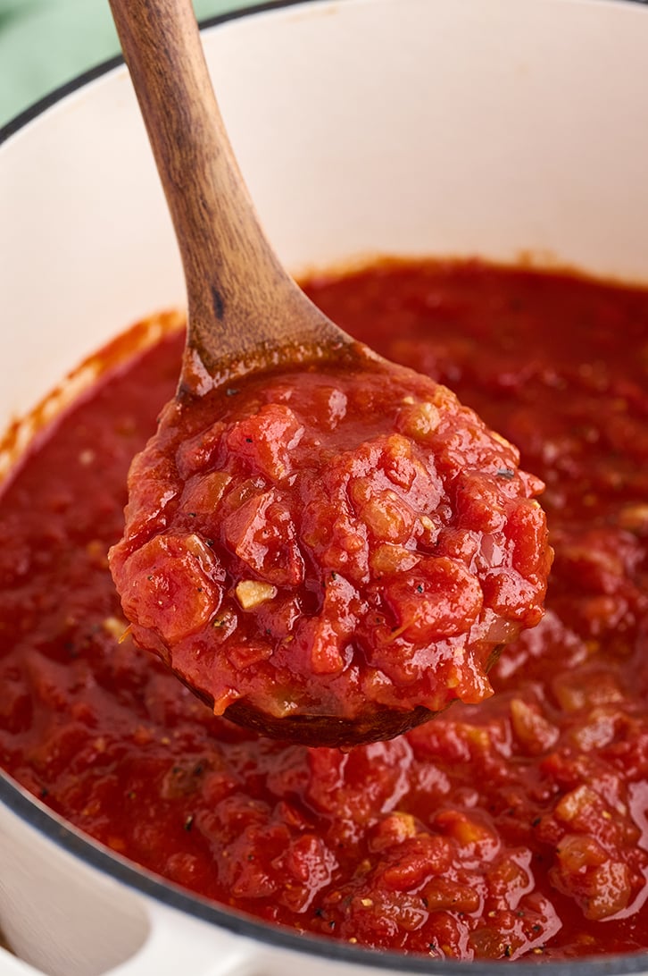 Scoopful of Homemade Marinara Sauce.