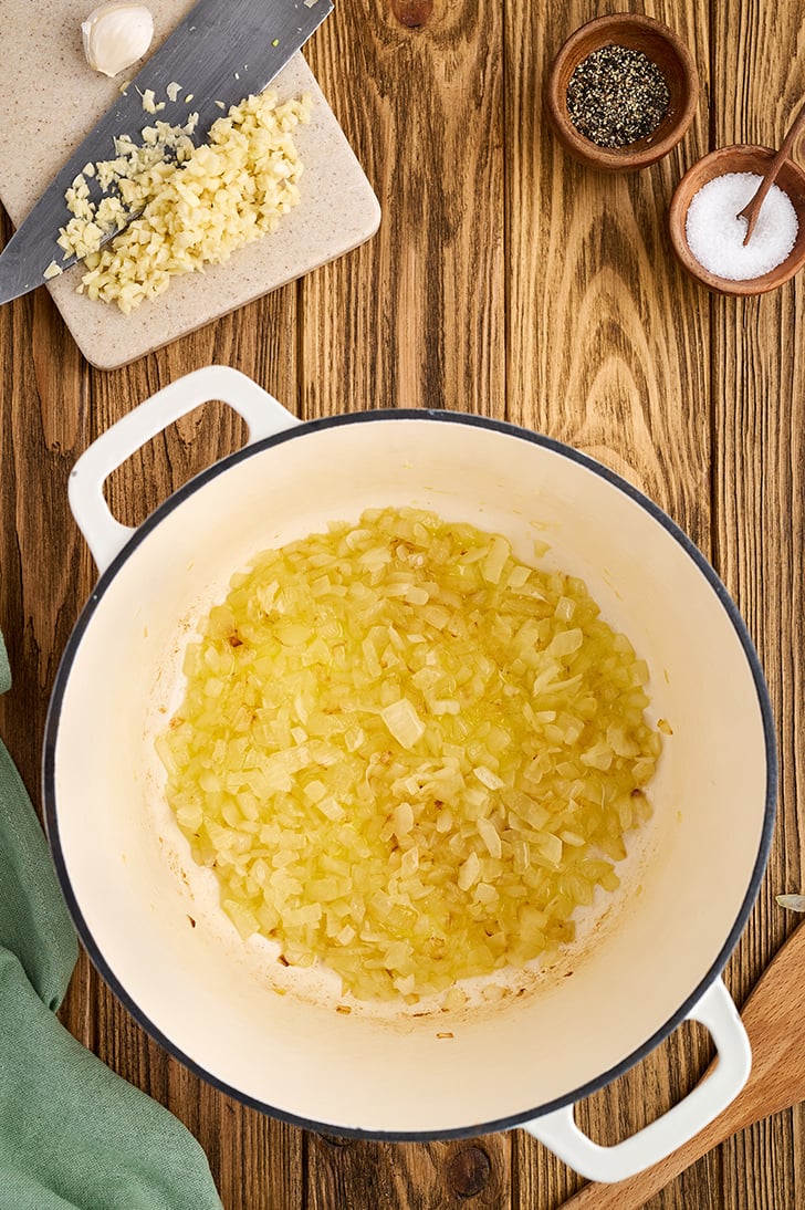 Onions in a white pot.